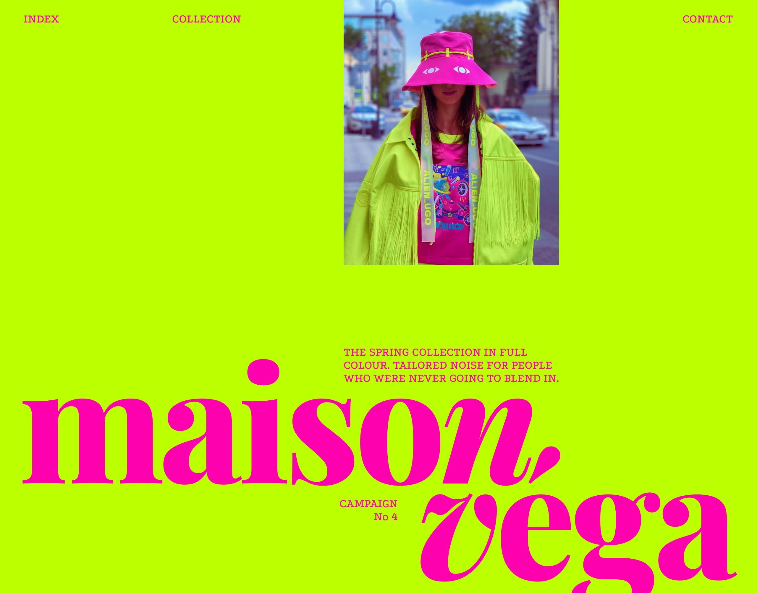 Acid-green landing page with a nav bar and a street photo of a model in a pink bucket hat and neon fringed jacket, above a giant magenta maison vega serif wordmark and campaign note.